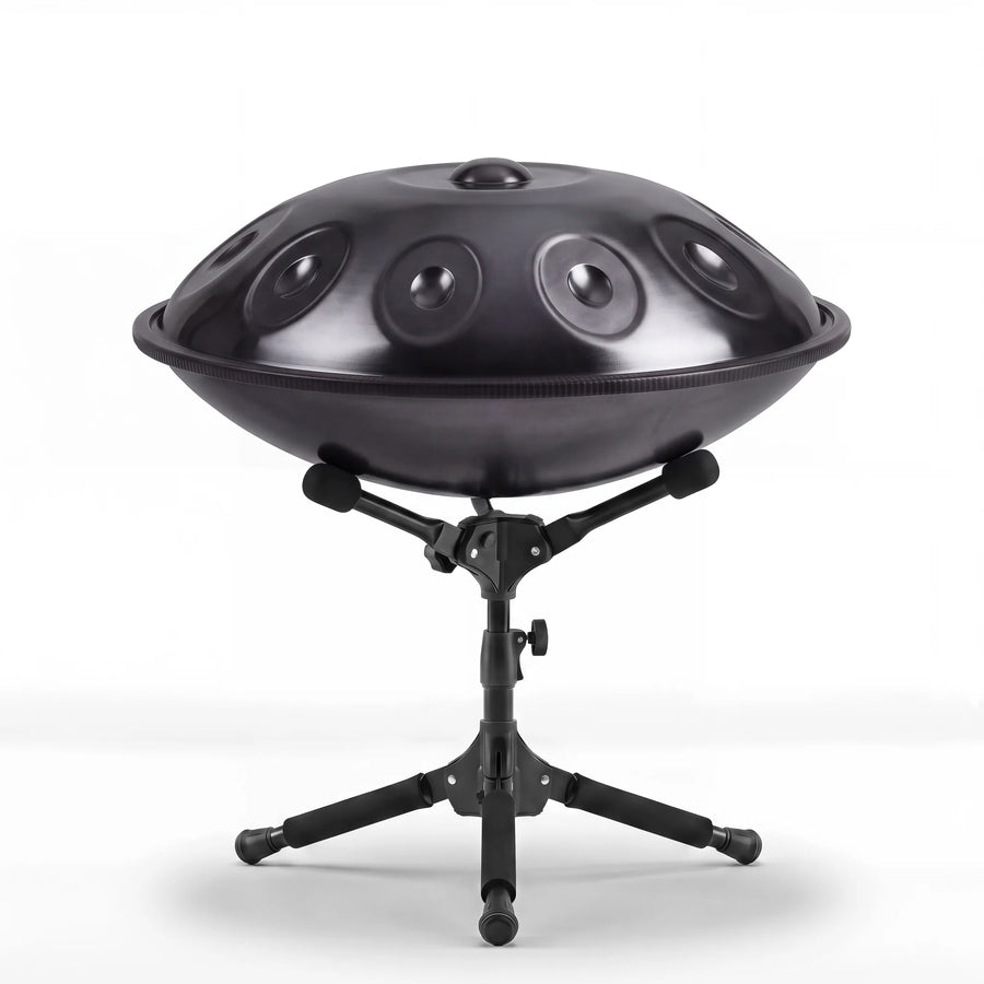 Sonant D Kurd handpan with 10 notes in a black finish on its folding stand — 12