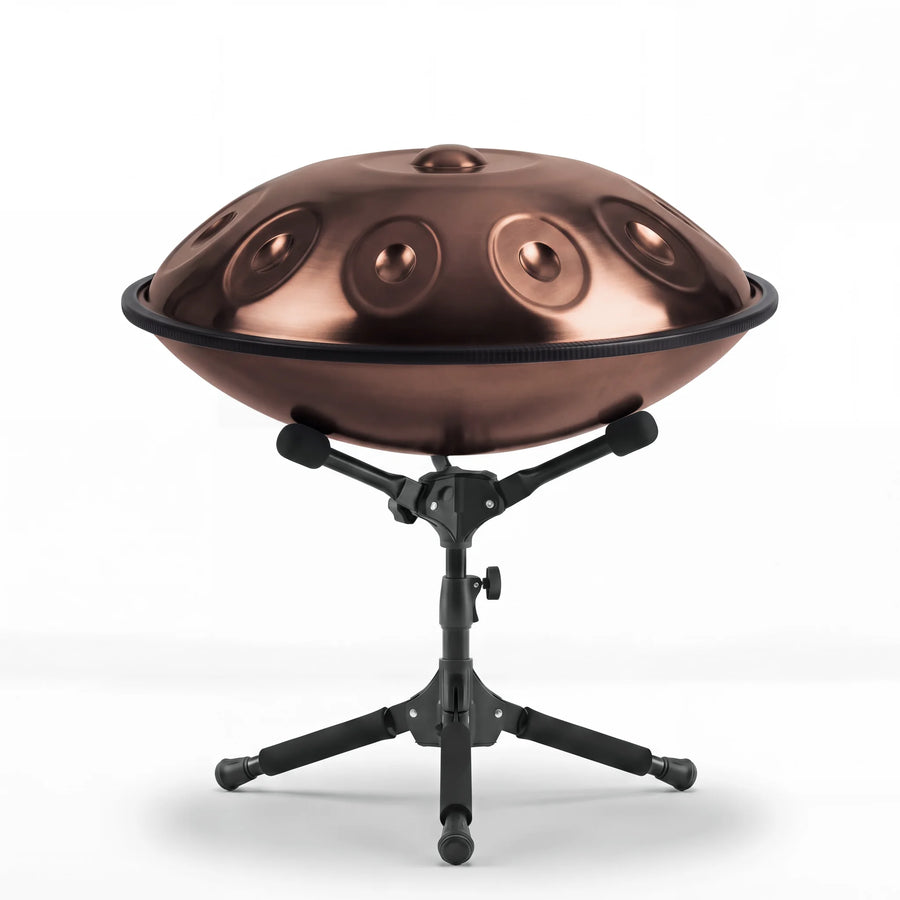 Sonant D Kurd handpan with 10 notes in a bronze finish on its folding stand — 18