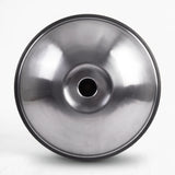 Underside of a Sonant D Kurd handpan with 10 notes in a silver finish, showing its central opening and rim — 4