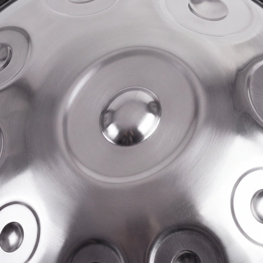 Close view of the central ding on a Sonant D Kurd handpan with 10 notes in a silver finish — 5