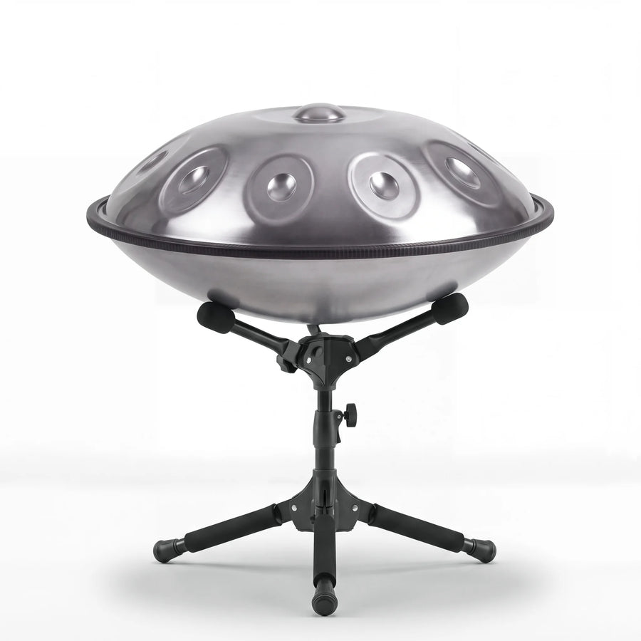 Sonant D Kurd handpan with 10 notes in a silver finish on its folding stand — 6