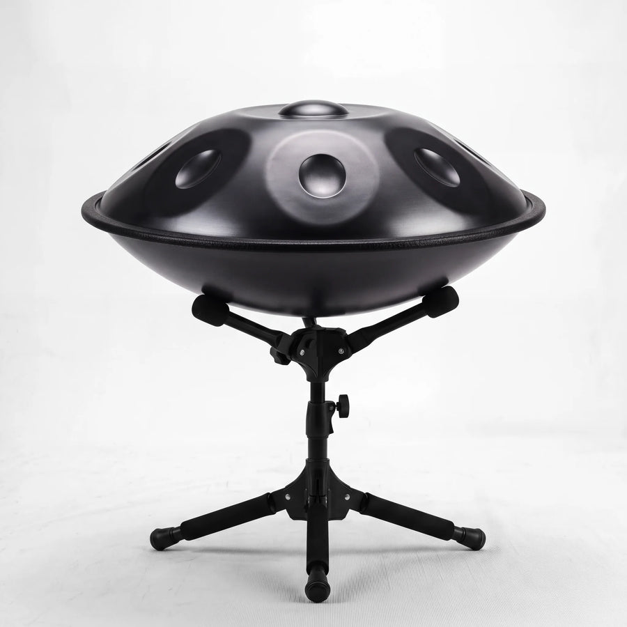 Sonant D Kurd handpan with 12 notes in a black finish on its folding stand — 18