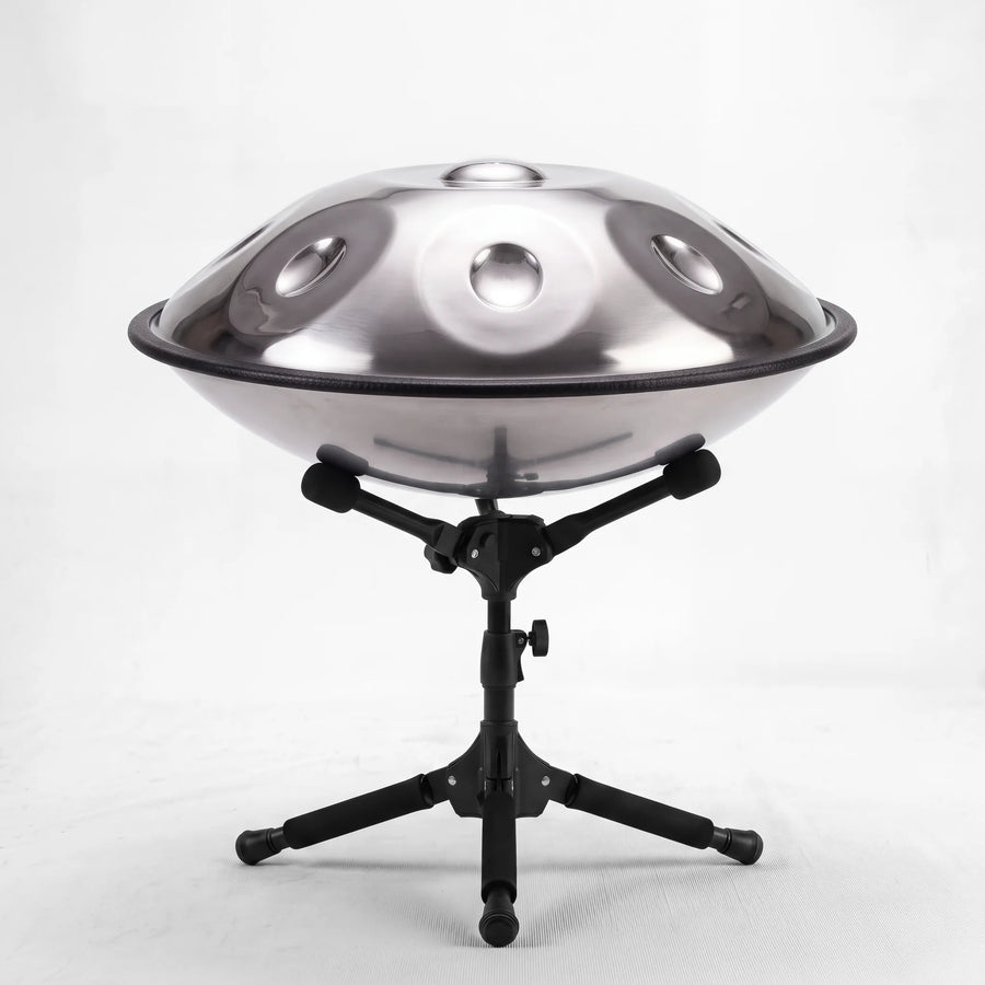 Sonant D Kurd handpan with 12 notes in a silver finish on its folding stand — 12