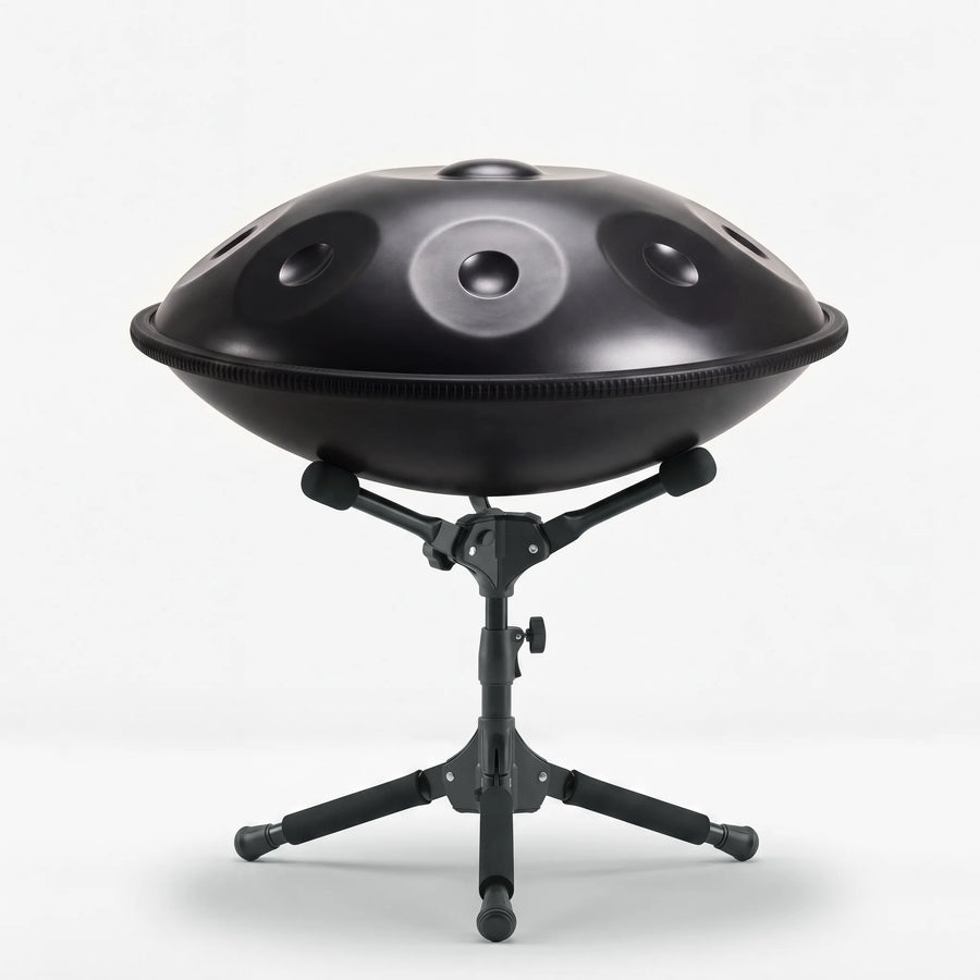 Sonant D Kurd handpan with 9 notes in a black finish on its folding stand — 6